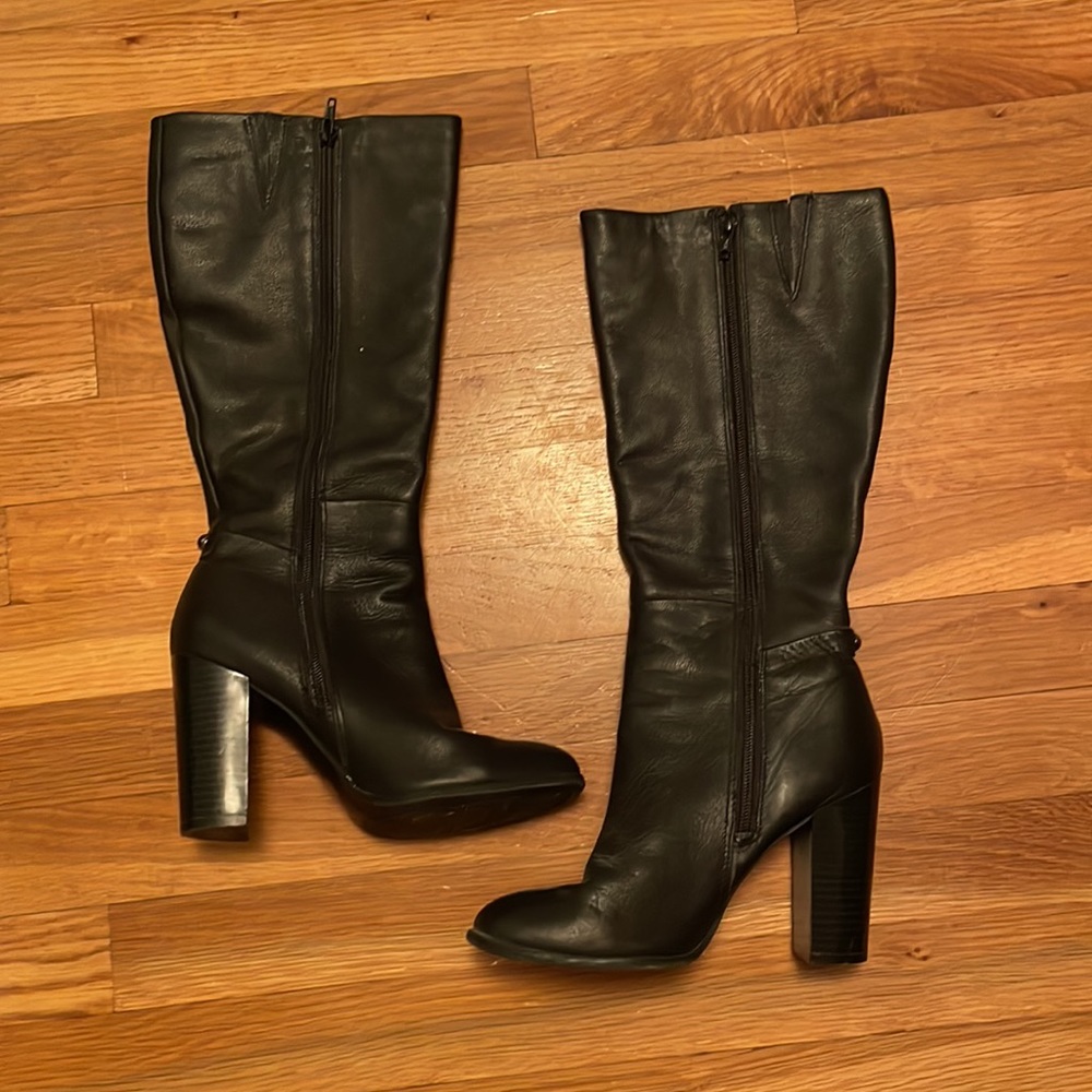 Black knee high zip up Liz & Co boots.